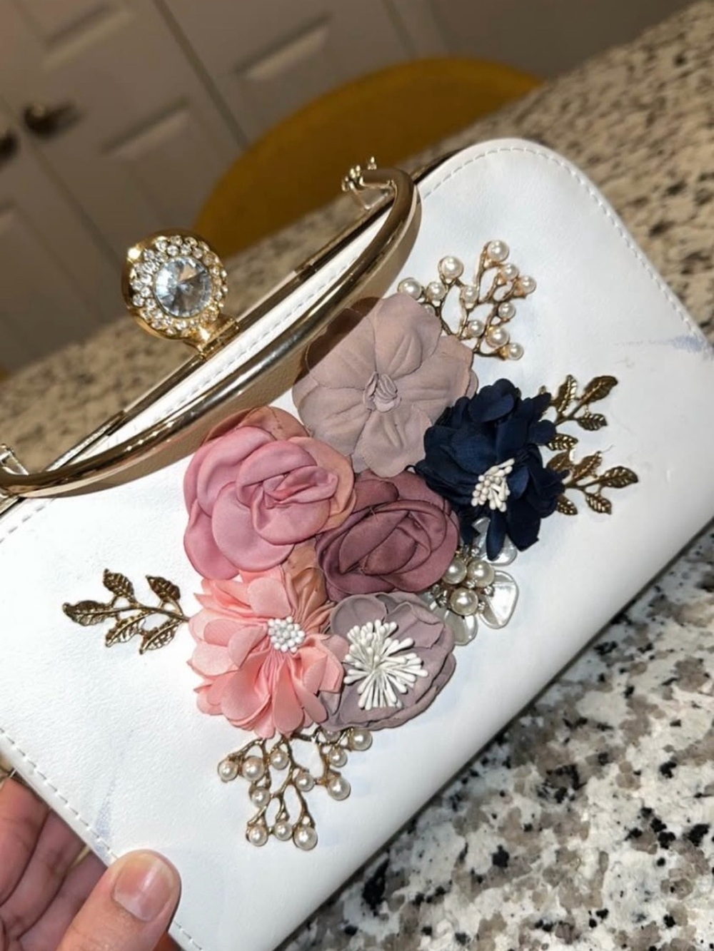 Floral Appliqué White Clutch with Multi-Colored Blooms